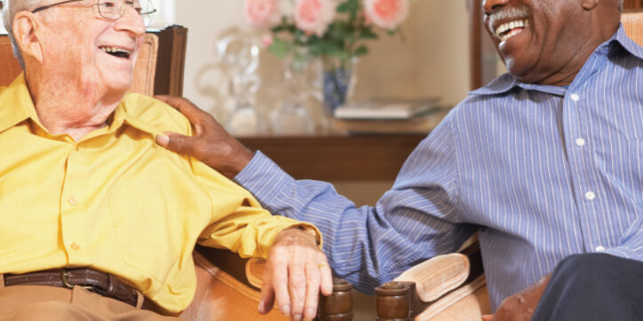 Senior men chatting in the common area