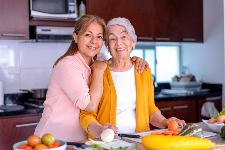 Women with her senior mother happy about senior living